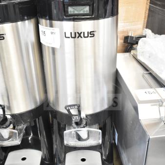 BRAND NEW SCRATCH AND DENT! Fetco L4D-20 Luxus 2 Gallon Stainless Steel Coffee Server with Stand. Minor surface blemishes.