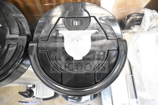 BRAND NEW SCRATCH AND DENT! Fetco L4D-20 Luxus 2 Gallon Stainless Steel Coffee Server with Stand. Funnel lift label visible.