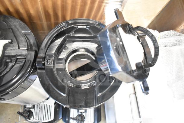 BRAND NEW Fetco L4D-20 Luxus 2 Gallon Stainless Steel Coffee Server with Stand; visible lid features and markings.