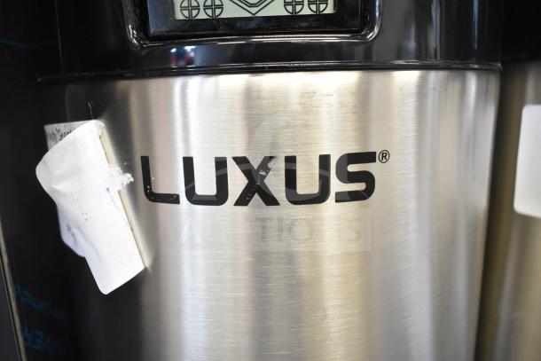 BRAND NEW SCRATCH AND DENT! Fetco L4D-20 Luxus 2 Gallon Stainless Steel Coffee Server, visible "LUXUS" logo.