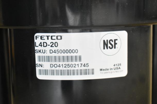 BRAND NEW SCRATCH AND DENT! Fetco L4D-20 Luxus 2 Gallon Stainless Steel Coffee Server with Stand label shows SKU, SN, and NSF mark.