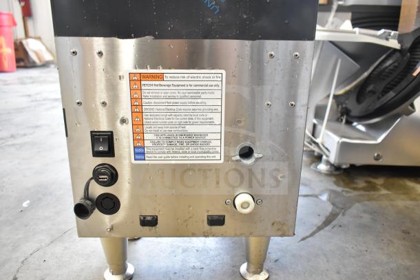 BRAND NEW SCRATCH AND DENT 2025 Fetco CBS-1251 Plus Series Automatic Coffee Brewer, metal brew basket, warning labels visible.
