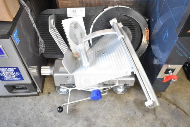 BRAND NEW Vollrath 40955 SLP330E/S 13" meat slicer, heavy duty, 1/2 hp, safe blade removal, 120V, minor scratches, ideal for deli use.