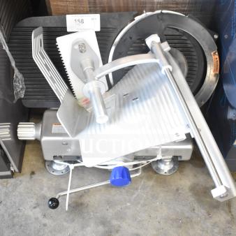BRAND NEW Vollrath 40955 SLP330E/S 13" meat slicer, heavy duty, 1/2 hp, safe blade removal, 120V, minor scratches, ideal for deli use.