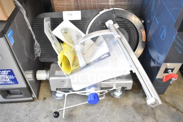 Brand new Vollrath 40955 SLP330E/S 13" heavy-duty meat slicer, 1/2 hp, with safe blade removal, scratch and dent condition.