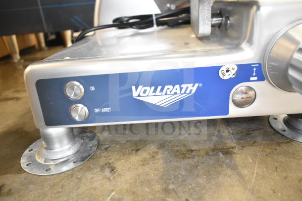 Brand new Vollrath 40955 SLP330E/S 13" deluxe meat slicer with scratch and dent. Features safe blade removal system, 1/2 hp motor.