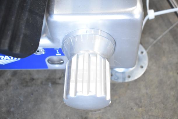 Vollrath 40955 SLP330E/S meat slicer, shown with adjustable blade knob, scratch and dent condition, 120V, 1/2 hp.