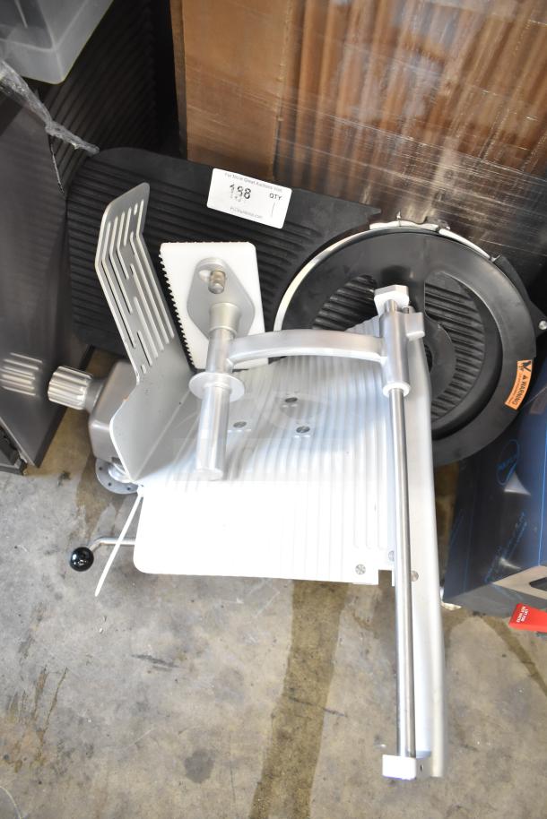 BRAND NEW Vollrath 40955 SLP330E/S 13" heavy-duty meat slicer; visible components; safe blade removal; slight scratches.