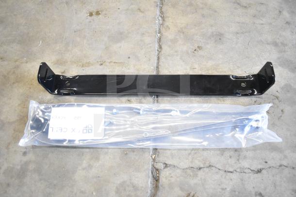 Black steel mounting bracket by Ex-Cell Kaiser, model B-1022, 18.5"x3"x2", new condition for outdoor receptacle.