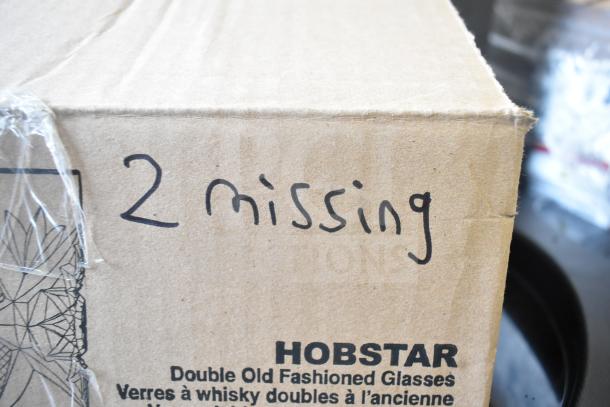 Box labeled "HOBSTAR Double Old Fashioned Glasses" with handwritten "2 missing." Part of a scratch and dent auction lot.