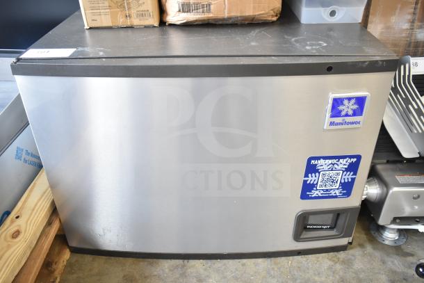 Brand new 2026 Manitowoc Indigo NXT IYP0600A-161 ice machine, 30", 672 lb capacity, visible minor scratches.