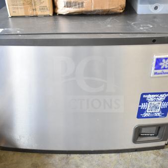 Brand new 2026 Manitowoc Indigo NXT IYP0600A-161 ice machine, 30", 672 lb capacity, visible minor scratches.
