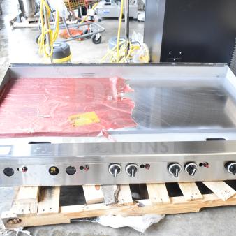 Brand new Garland GTGG60-GT60M 60" liquid propane griddle with thermostatic controls, 140,000 BTU, minor scratches.