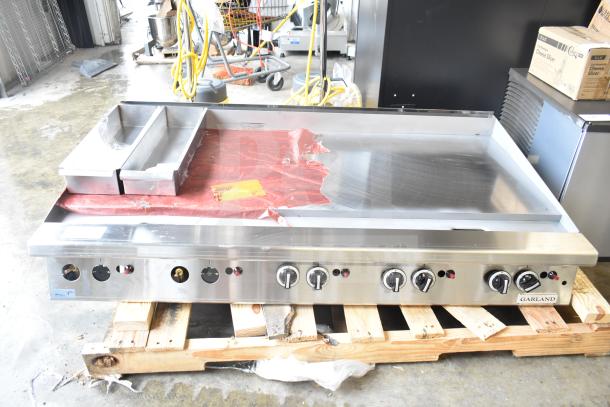 Brand new Garland GTGG60-GT60M 60" liquid propane countertop griddle with thermostatic controls, 140,000 BTU.