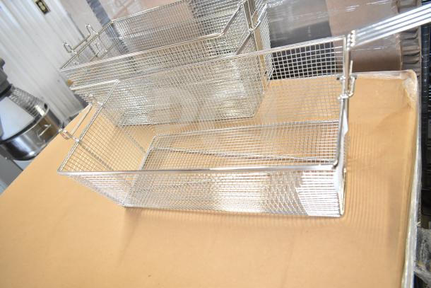 Three Garland fry baskets, new condition with minor scratches, wire mesh design, ideal for commercial use.