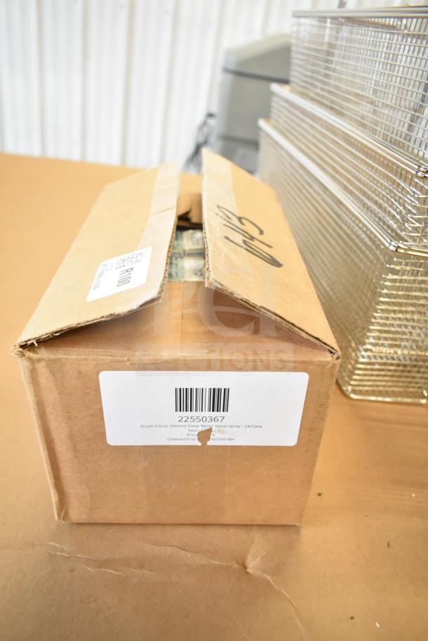 Brown cardboard box labeled "22550367 Zicam 0.5 oz. Intense Sinus Relief Nasal Spray - 24/Case," opened slightly, box appears in good condition.