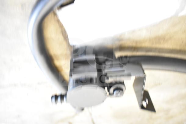 Blurry image of an automotive component, likely the Dorman Vapor Can Vent Valve 911-239. Condition unclear.