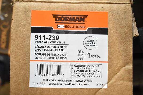 Dorman Vapor Can Vent Valve 911-239 label on box, indicating one piece, new condition, with quality innovation rating.