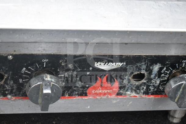 Vollrath Cayenne gas griddle with thermostatic controls, showing worn dials and brand logo.
