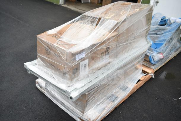 Four new scratch and dent items on a pallet, including a Glad step pedal trash can. Boxed and plastic-wrapped for auction, label showing "273".