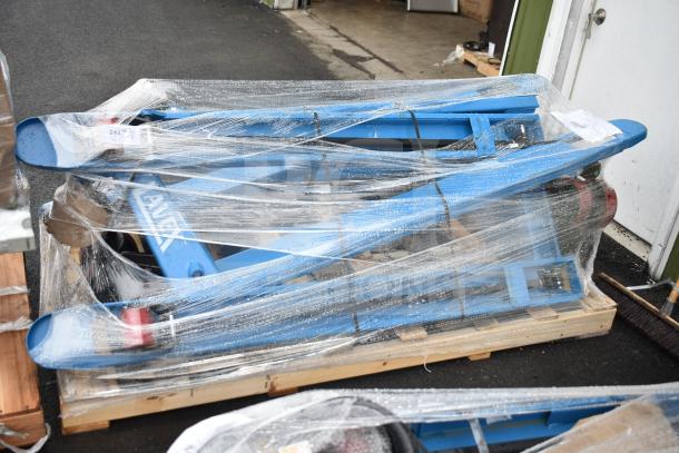 2 brand new Lavex 481XN25DF1600 manual pallet jacks, scratched and dented, 27"x63" forks, 5500 lb capacity, wrapped for auction.