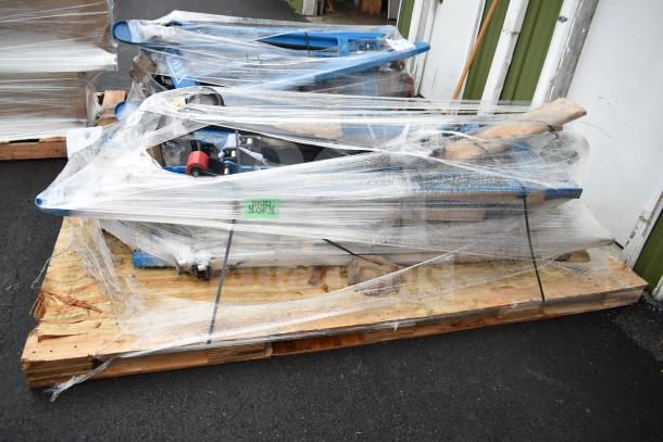 2 Lavex 481XN25DF1600 manual pallet jacks, 27"x63" forks, 5,500 lb. capacity, scratch and dent, wrapped on pallet with label "SKID 4 OF 4."