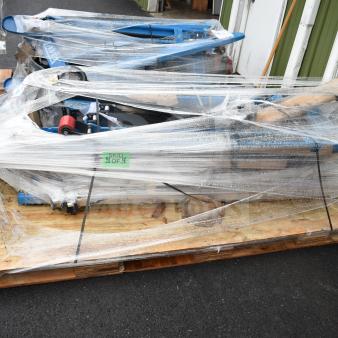 2 Lavex 481XN25DF1600 manual pallet jacks, 27"x63" forks, 5,500 lb. capacity, scratch and dent, wrapped on pallet with label "SKID 4 OF 4."