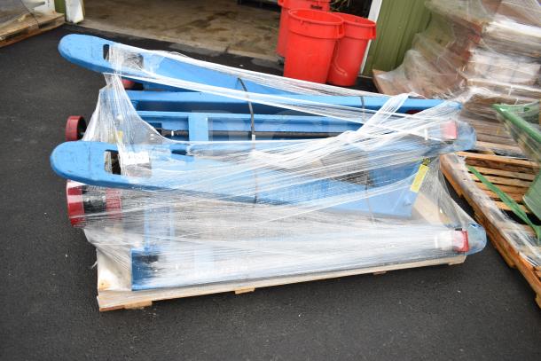 "New Lavex 481XN25DF1600 Manual Pallet Jack, 27x63" forks, 5,500 lb capacity, wrapped for auction. Potential savings, scratch and dent."
