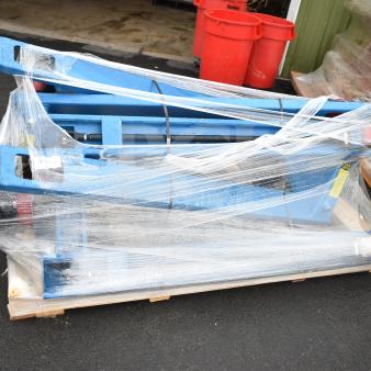 "New Lavex 481XN25DF1600 Manual Pallet Jack, 27x63" forks, 5,500 lb capacity, wrapped for auction. Potential savings, scratch and dent."