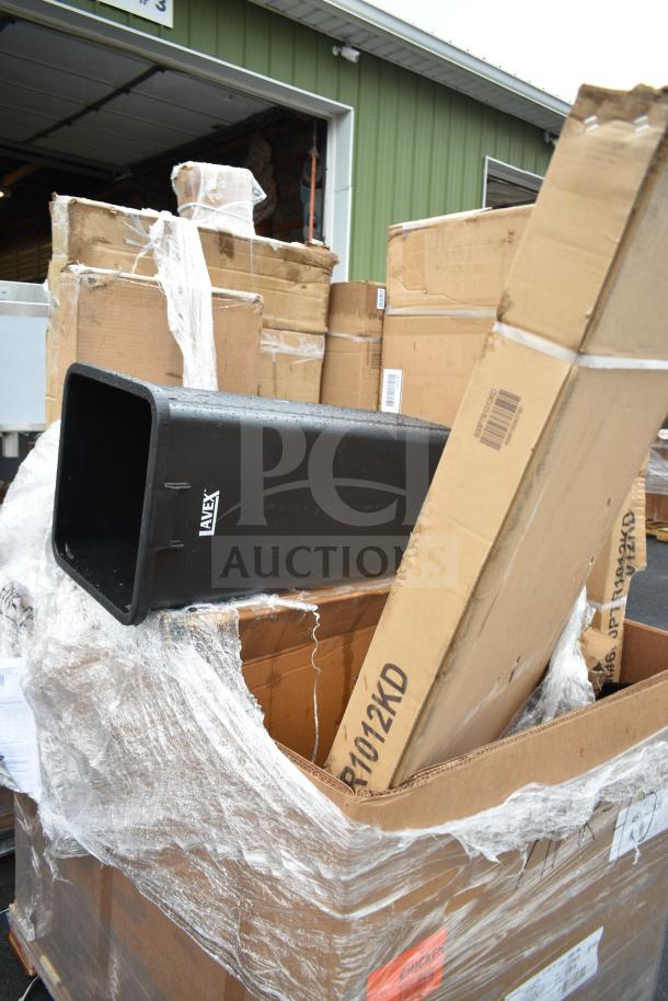 Cardboard boxes with plastic wrap containing scratch and dent items, including ALVEX sheet pan racks. Auction lot APR-45.