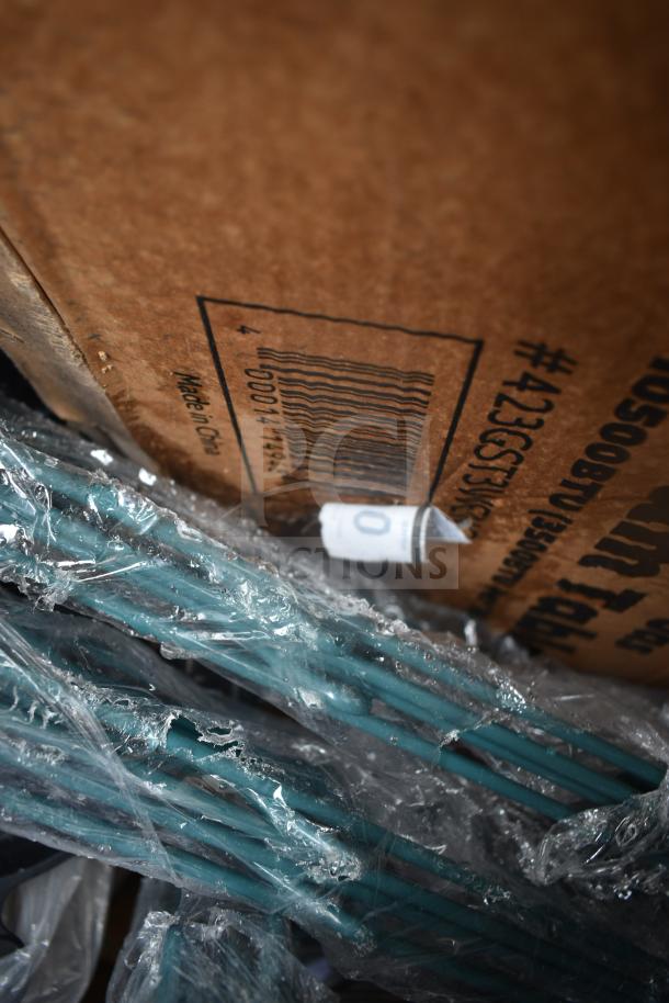 Cardboard box labeled "Made in China," containing new scratch and dent items, partially visible in protective wrap.