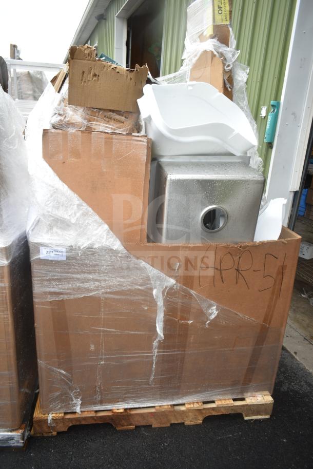 Pallet of nine scratch-and-dent items, including a metal sink and white shelves. Marking reads "APR-51."