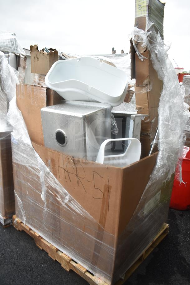 Cardboard pallet with wrapped scratch and dent items, including a new white sink and metal shelving. Marking: "APR-51."
