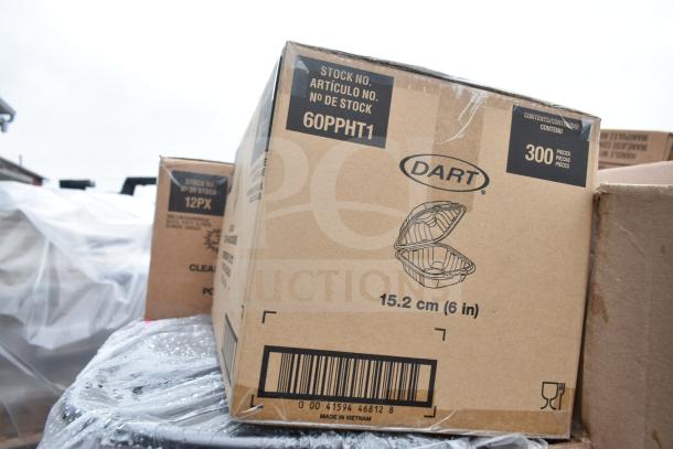 Cardboard boxes labeled "Dart," stock number 60PPHT1 visible. Boxes wrapped in plastic, part of "Scratch and Dent" auction.