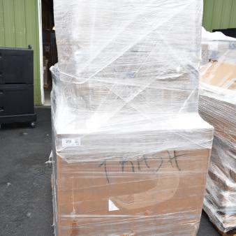 Pallet of 15 new scratch and dent items including a chair and liquor display rack, wrapped in plastic with handwritten markings.