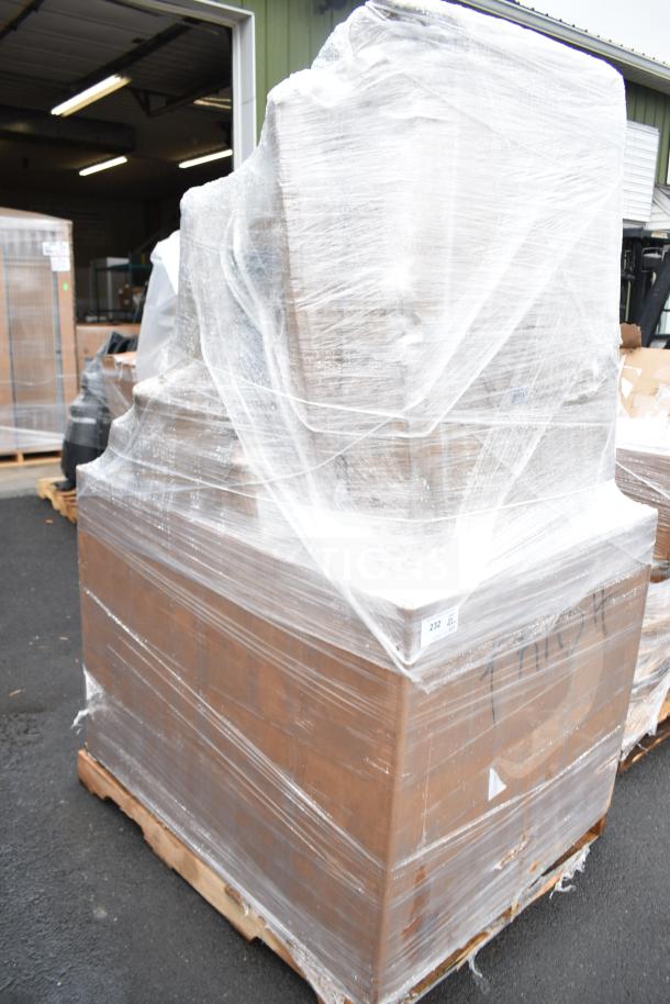 Pallet wrapped in plastic containing 15 new scratch and dent items, including a chair and liquor display rack. Label marked "232".