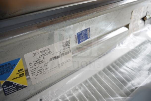 Greenheck fire damper with label showing model FDPL-S-120S and other specifications, part of 13 various items lot.