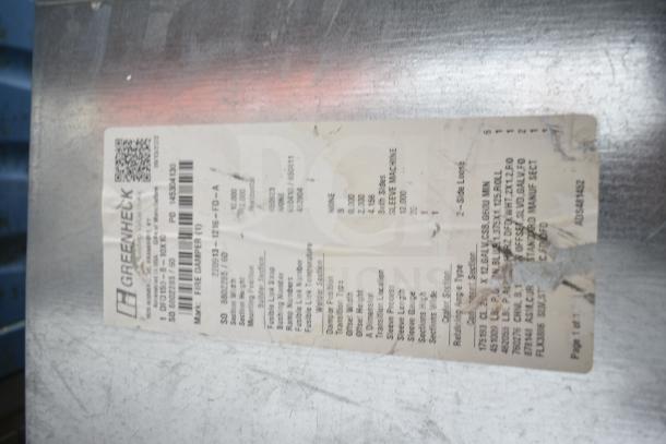 Label on Greenheck fire damper. Includes model FD-1515, serial 2202913-1126-FD-A, and installation notes. Worn condition.