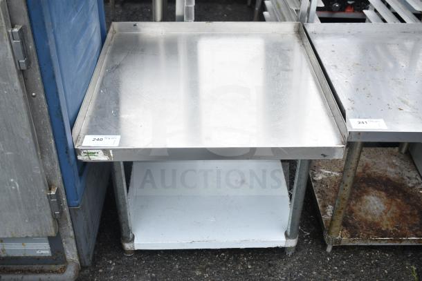 Regency 600ES3030G equipment stand with under shelf, stainless steel, used condition, metal legs, auction tag visible.