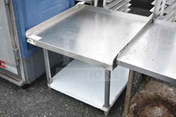 Regency 600ES3030G Equipment Stand with under shelf, stainless steel, used condition, numbered tags visible.