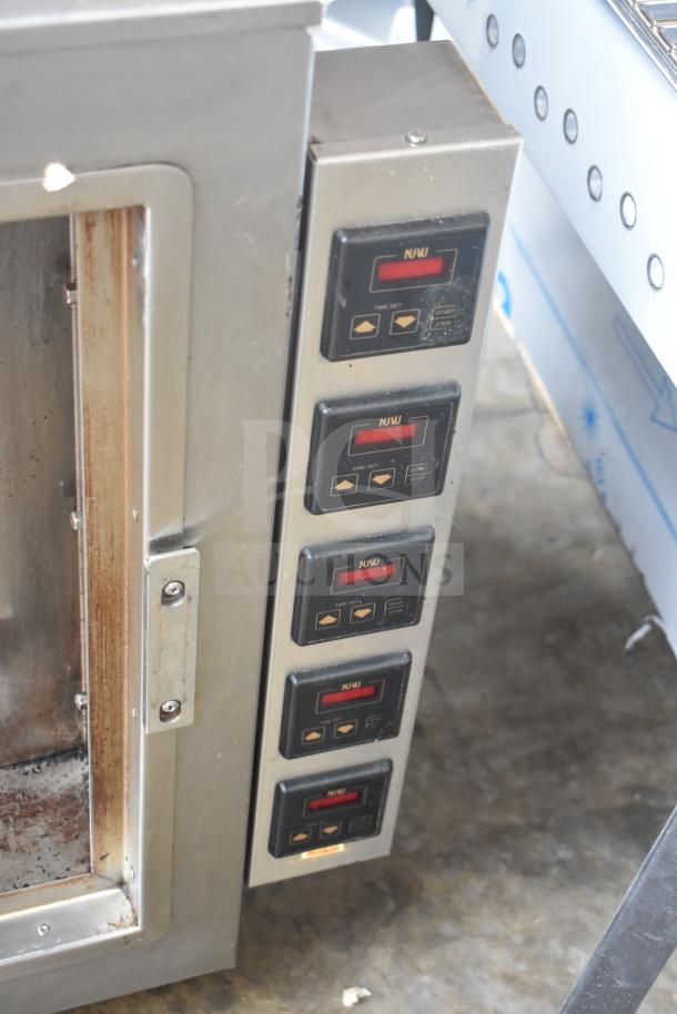 Nu Vu PMA-5/18 commercial electric oven with digital controls. Missing glass door. 208 volts, 3 phase.