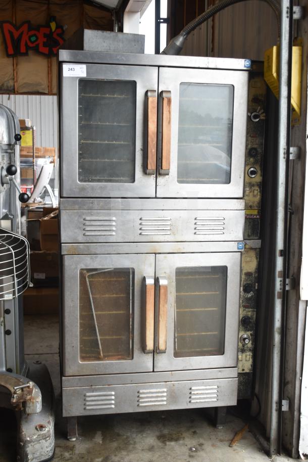 Two Vulcan commercial full-size convection ovens with view-through doors and thermostatic controls. Good condition.