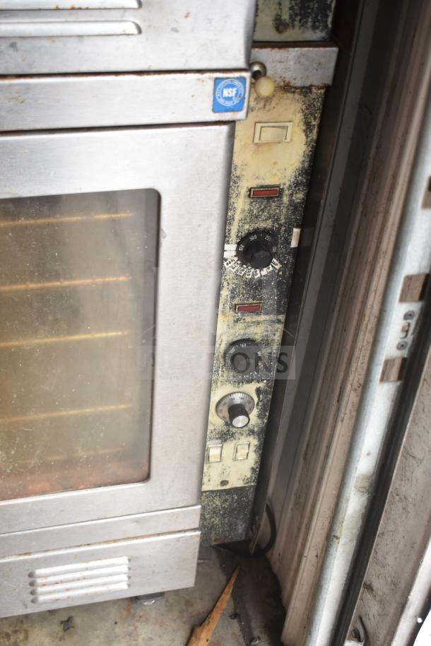 Vulcan commercial convection oven with view-through doors and thermostatic controls, NSF certified, showing signs of wear.