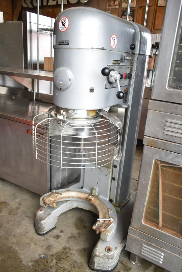 Hobart M802 80-quart mixer with bowl guard, commercial floor style, 200 volts, 3 phase. Some wear visible on base.