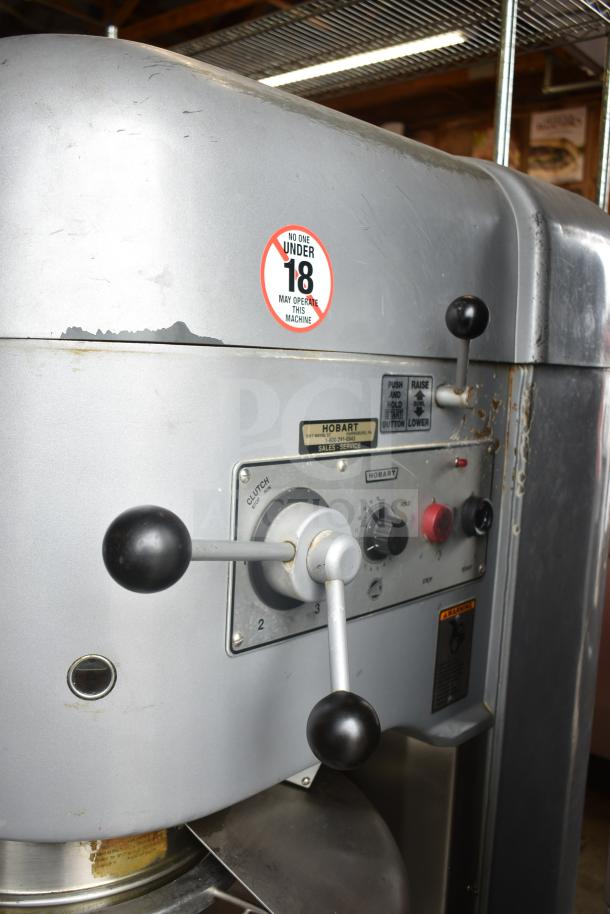 Hobart M802 commercial floor mixer, 80-quart capacity, with bowl guard. 200 volts, 3 phase. Control panel and condition visible.