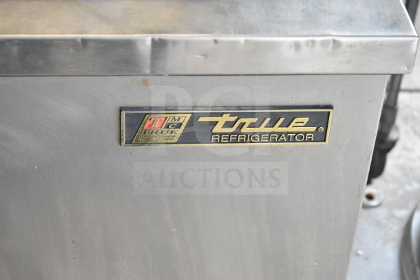 True TWT-60 commercial work top cooler, stainless steel, 2-door, with shelf, visible True logo plate, 115V, 1 Phase.