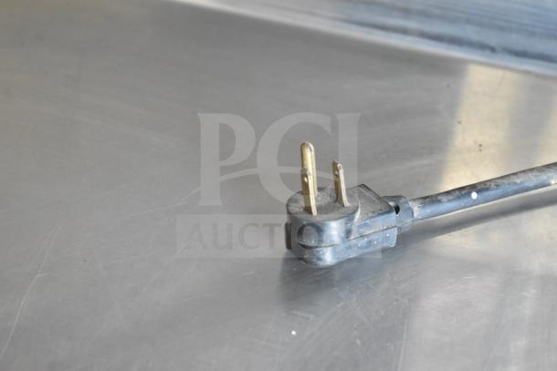 True TWT-60 commercial 2 door work top cooler plug, showcasing power compatibility. 115 volts, 1 phase.