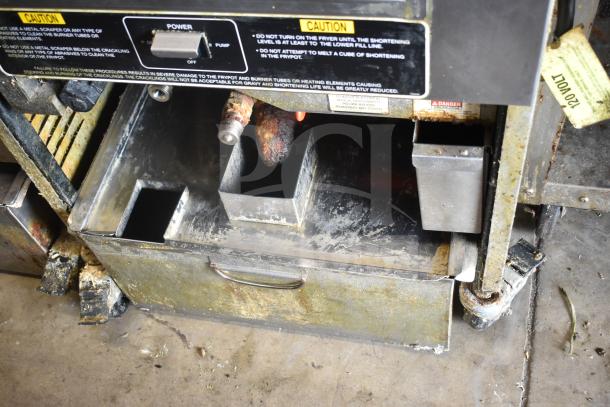 2020 Henny Penny PFG-691 Computron 8000 pressure fryer, natural gas, on casters, 80,000 BTU, worn condition.