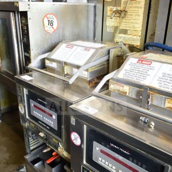 Henny Penny PFG-691 Computron 8000 commercial gas pressure fryer, 100,000 BTU, on casters. Control panel visible, fair condition.