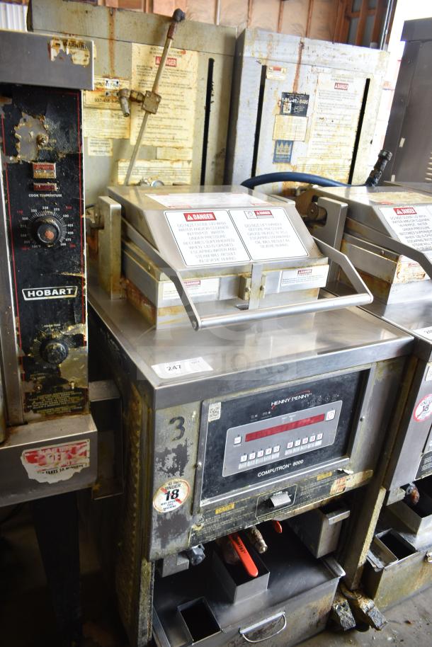 Henny Penny PFG-691 Computron 8000 fryer, natural gas powered, 100,000 BTU, on commercial casters, used condition.